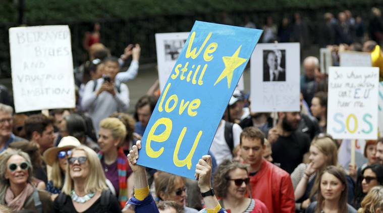 People hold banners during a demonstration against Britain's decision to leave the European Union, in central London People hold banners during a demonstration against Britain's decision in BREXIT