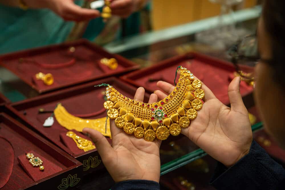 Gold prices continued their ascent, although gains were trimmed