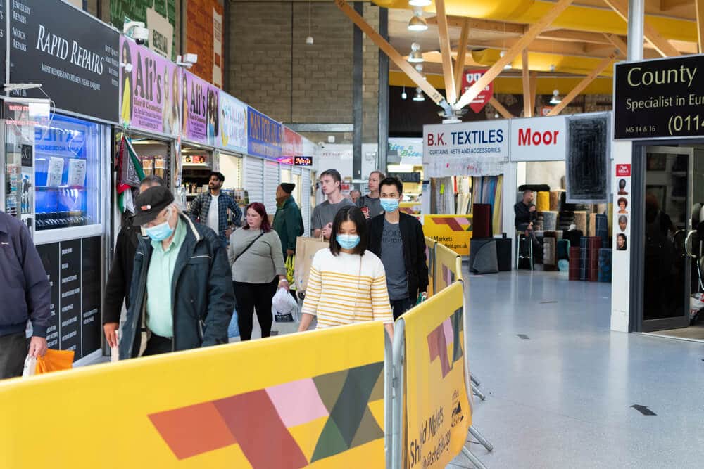 GBP Separate walkways at The Moor Market during Coronavirus crisis. Social distancing orders. Indoor shopping center in the city center of Sheffield