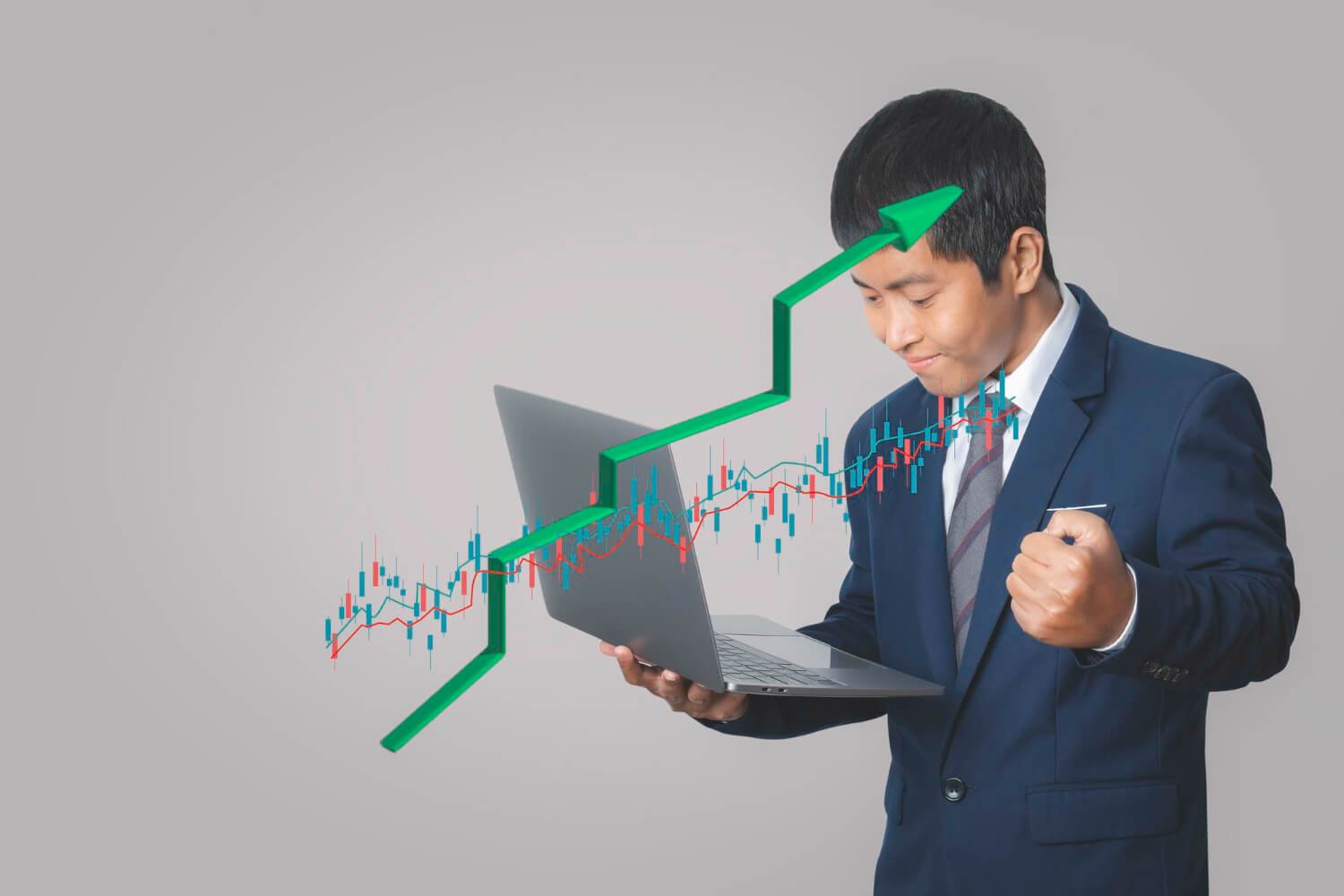 businessman using laptop computer analysing forex trading graph financial data (1)
