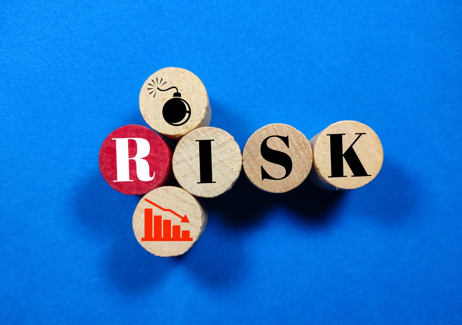 wooden block cylinderrisk icon with word risk business concept (1)