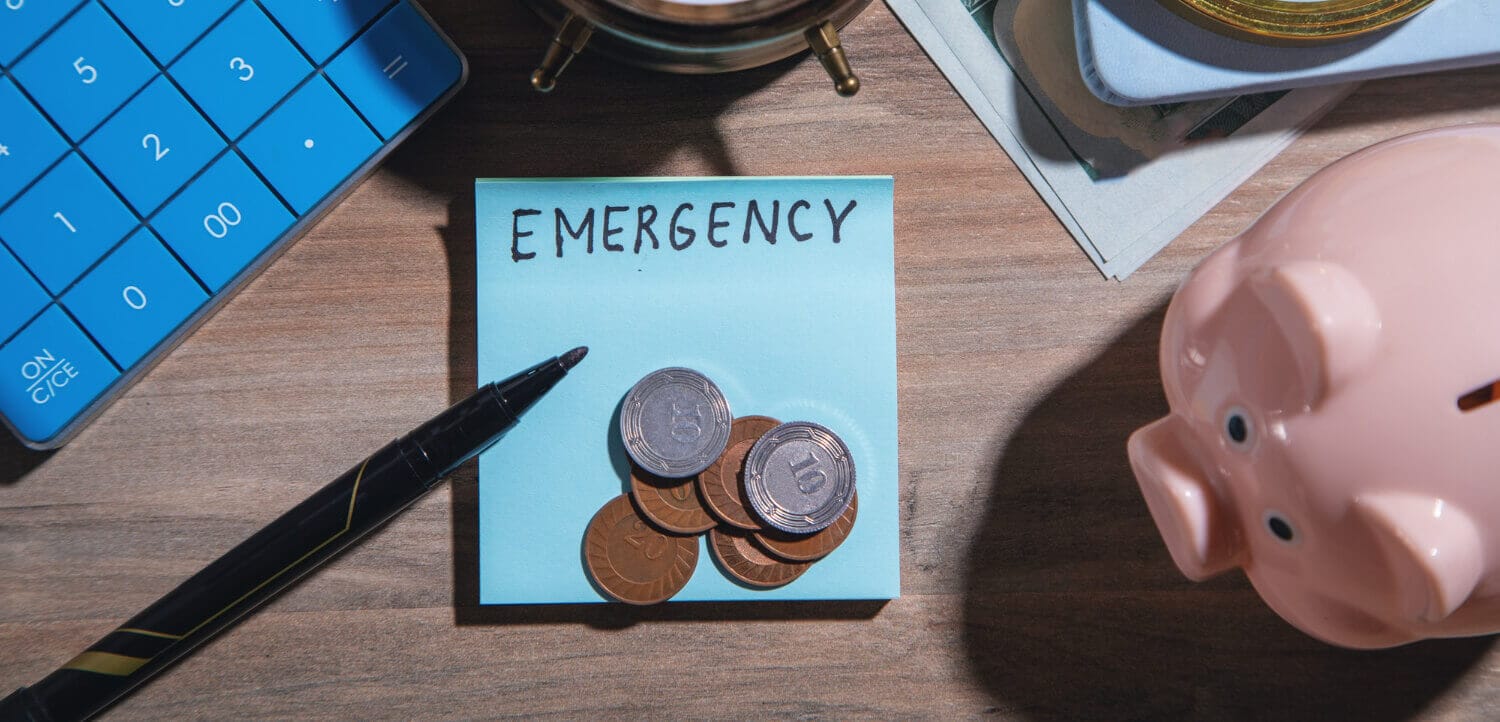 word emergency with coins marker piggy bank (1) (1)