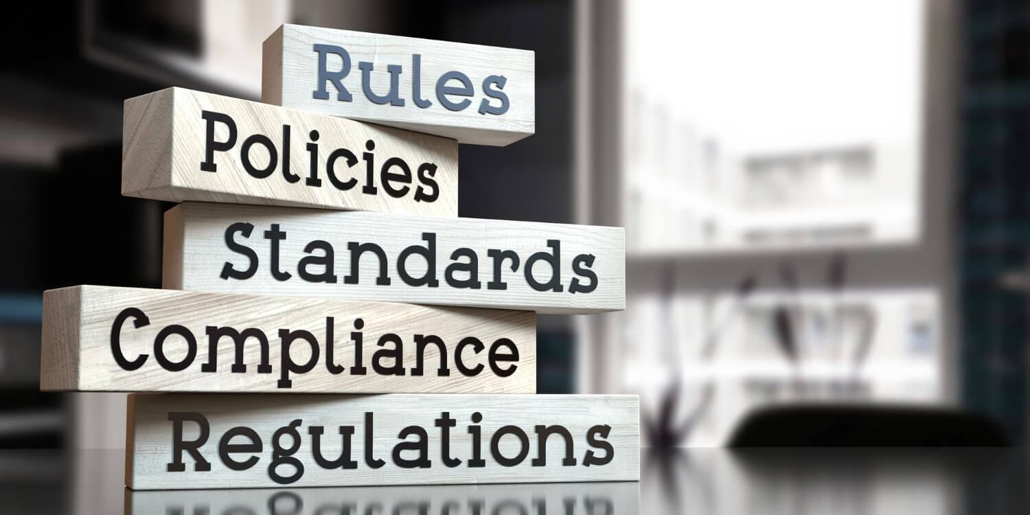 rules policies standards compliance regulations words wooden blocks 3d illustration (1)
